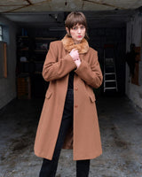 Get ready to slay the Y2k trend with this brown woolmix spring coat! Featuring a luxurious real fur collar, this coat is for everyone who loves to be elegant.