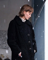 Wrap yourself in elegance with this vintage 80s 90s black real fur coat. This timeless piece adds a touch of luxury to any outfit. 