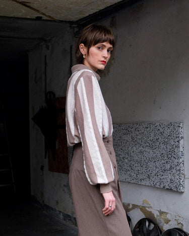 Upgrade your sweater game with this Vintage 80s brown and white striped sweater. Made for both style and comfort, this thin sweater is perfect for any occasion. Don't settle for boring sweaters.