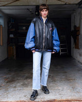 Unleash your inner rebel with this Vintage 80s Uncle Sam bomber leather jacket in size XL. Featuring a laid back, old-school vibe, this jacket exudes coolness and effortless style