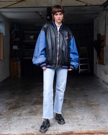 Unleash your inner rebel with this Vintage 80s Uncle Sam bomber leather jacket in size XL. Featuring a laid back, old-school vibe, this jacket exudes coolness and effortless style
