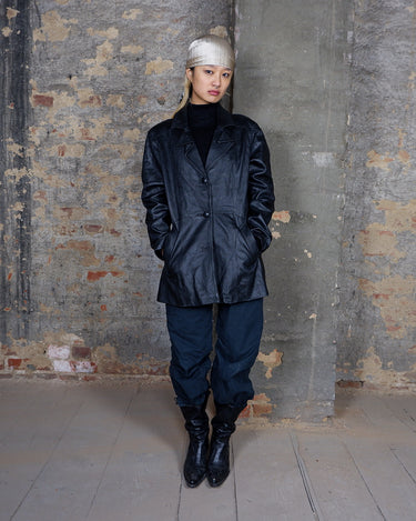 Sleek, edgy, and timeless – this vintage 80s black leather jacket is a true classic.
Made from genuine leather with a clean, structured fit, this piece blends bold 80s energy with modern minimalism. The sharp cut gives that effortlessly cool edge, perfect for everyday wear.
