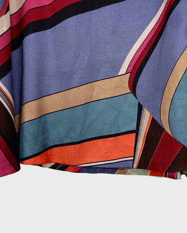 This Y2k skirt serves pure elegance with its flowing silhouette and vibrant geometric print in magenta, teal, orange, and warm brown. Light and easy to wear, it’s comfortable and anything but boring—designed for those who dress with intention.