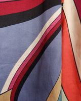 This Y2k skirt serves pure elegance with its flowing silhouette and vibrant geometric print in magenta, teal, orange, and warm brown. Light and easy to wear, it’s comfortable and anything but boring—designed for those who dress with intention.