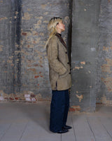 Experience the ultimate warmth and coziness in our Vintage 80s brown shearling coat! This timeless piece, available in XXS - XS, will keep you snug and stylish all winter long. Say "bye-bye" to cold weather!