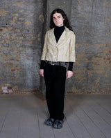 Bring some serious sass to your wardrobe with this fab vintage blazer! Crafted from real fur and showcasing 70s 80s flair, this beige spring blazer is the perfect mix of elegance and playfulness.