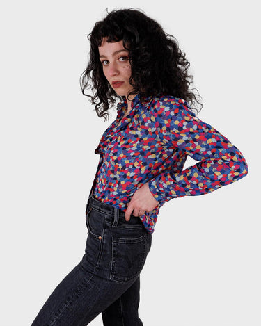 Sparkle like the '80s, but with of colors in this very thin and light transparent blouse. Please keep in mind, that some parts of the hem were handsewn /reworked by me (last photo).