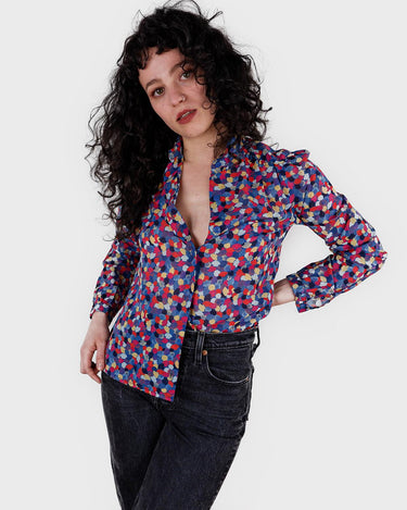 Sparkle like the '80s, but with of colors in this very thin and light transparent blouse. Please keep in mind, that some parts of the hem were handsewn /reworked by me (last photo).