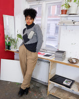 Get cozy in this vintage 90s grey lambswool angora turtleneck sweater (thin), with a fun geometric pattern. Made with a mix of lambswool and angora and a bit polyamid, this sweater will keep you warm. Its long fit offers versatility and the turtleneck adds a touch of elegance. Perfect for chilly days!