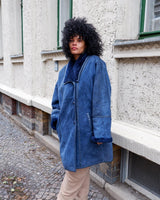 Cozy up like it's the 80s with this vintage navy blue shearling coat. Perfect for colder days! Get your winter fashion game on point.
