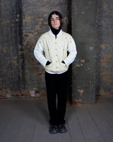Rare 80s collab between French art rebel Castelbajac and Italian luxury label ICEBERG. A bold mix of soft knit sleeves and lightweight woven fabric, detailed with silver snaps and zip pockets. Playful, offbeat, and seriously collectible.