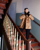 Stay cozy with our premium vintage 80s knitter optic jacket. With a real fur lining (except the sleeves) and collar, this jacket provides ultimate warmth!