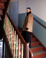 Stay cozy with our premium vintage 80s knitter optic jacket. With a real fur lining (except the sleeves) and collar, this jacket provides ultimate warmth!