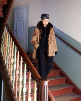 Stay cozy with our premium vintage 80s knitter optic jacket. With a real fur lining (except the sleeves) and collar, this jacket provides ultimate warmth!