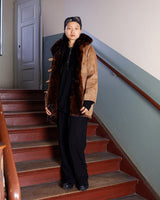 Stay cozy with our premium vintage 80s knitter optic jacket. With a real fur lining (except the sleeves) and collar, this jacket provides ultimate warmth!