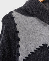 Get cozy in this vintage 90s grey lambswool angora turtleneck sweater (thin), with a fun geometric pattern. Made with a mix of lambswool and angora and a bit polyamid, this sweater will keep you warm. Its long fit offers versatility and the turtleneck adds a touch of elegance. Perfect for chilly days!