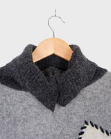 Get cozy in this vintage 90s grey lambswool angora turtleneck sweater (thin), with a fun geometric pattern. Made with a mix of lambswool and angora and a bit polyamid, this sweater will keep you warm. Its long fit offers versatility and the turtleneck adds a touch of elegance. Perfect for chilly days!
