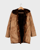 Stay cozy with our premium vintage 80s knitter optic jacket. With a real fur lining (except the sleeves) and collar, this jacket provides ultimate warmth!