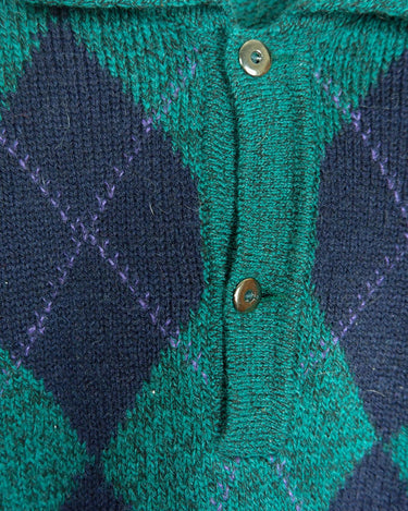 Stay cozy and classy in this vintage 90s green argyle sweater. Perfect for sizes M-L, this sweater features a classic argyle pattern and a pop of playful green