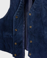 Introducing our latest obsession: a vintage 80s navy blue leather vest with unique stitching at the collar. Who doesn't love a good leather vest? Perfect for adding some edge to any outfit.