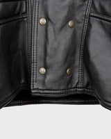 Experience timeless style with this Vintage 80s black faux leather shearling coat, featuring a warm lining that will keep you cozy. Just a heads up, the sleeves are not lined for extra warmth.