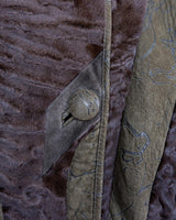 Add a touch of eccentricity to your wardrobe with this vintage 80s long brown leather fur coat. Featuring unique patchwork leather and a cozy fur lining, this XL-XXL coat is perfect for making a bold statement