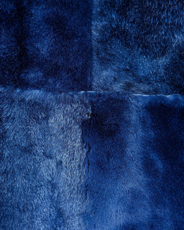 Cozy up like it's the 80s with this vintage navy blue shearling coat. Perfect for colder days! Get your winter fashion game on point.