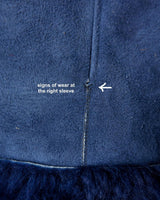 Cozy up like it's the 80s with this vintage navy blue shearling coat. Perfect for colder days! Get your winter fashion game on point.