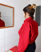 This XS Vintage 80s red wool jacket boasts a timeless and classic appeal with its unique double rows button design. Crafted with high-quality wool fabric, this jacket exudes a refined look.