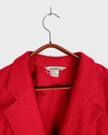 This XS Vintage 80s red wool jacket boasts a timeless and classic appeal with its unique double rows button design. Crafted with high-quality wool fabric, this jacket exudes a refined look.
