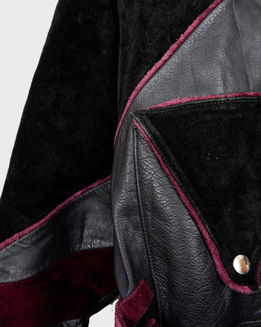 Experience the edgy and unique style of the 80s with our Vintage Black/Burgundy Patchwork Biker Leather Jacket. Crafted from high-quality leather, this jacket features a bold color combination of black and burgundy.
