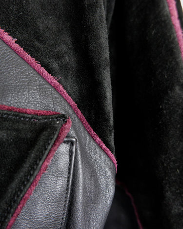 Experience the edgy and unique style of the 80s with our Vintage Black/Burgundy Patchwork Biker Leather Jacket. Crafted from high-quality leather, this jacket features a bold color combination of black and burgundy.