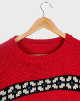 Forget the cold weather blues with this handknitted red vintage unisex sweater - crawl into cozy comforts! Its thick red fabric brings one-of-a-kind style and unmatched warmth! Snug and stylish - what more could you want?