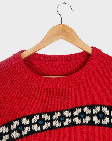 Forget the cold weather blues with this handknitted red vintage unisex sweater - crawl into cozy comforts! Its thick red fabric brings one-of-a-kind style and unmatched warmth! Snug and stylish - what more could you want?