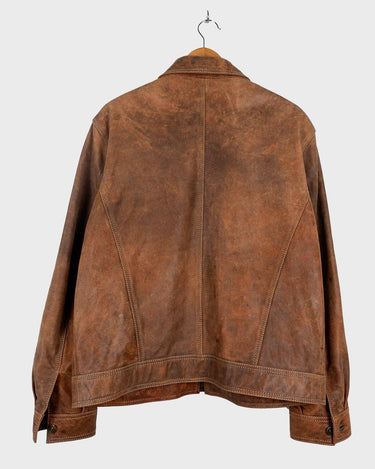 Say goodbye to the days of boring, new-and-shiny leather jackets! Get the good old vintages vibes with this used look 90s brown leather jacket that's already been through the ropes and just waiting to take you on a wild ride. Rock it with confidence! Please keep in mind that this vintage leather jacket has some flaws f.e last photos.
