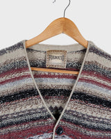 Layer up your look with this classic vintage wool vest! This 80s / 90s boho vest will add a splash of color to any outfit.