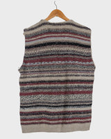 Layer up your look with this classic vintage wool vest! This 80s / 90s boho vest will add a splash of color to any outfit.