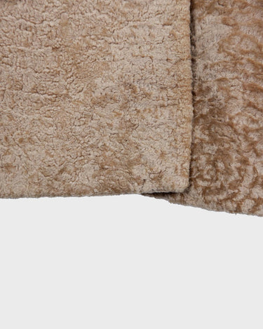 Wrap yourself in luxury with this premium vintage 70s brown real fur jacket! With its timeless design and XS size, you will stay cozy all winter long!