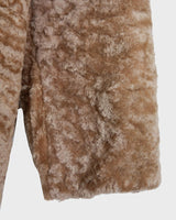 Wrap yourself in luxury with this premium vintage 70s brown real fur jacket! With its timeless design and XS size, you will stay cozy all winter long!