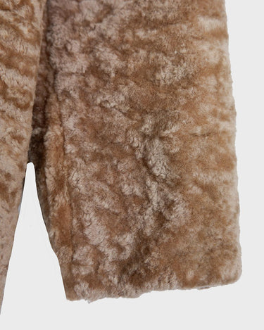 Wrap yourself in luxury with this premium vintage 70s brown real fur jacket! With its timeless design and XS size, you will stay cozy all winter long!