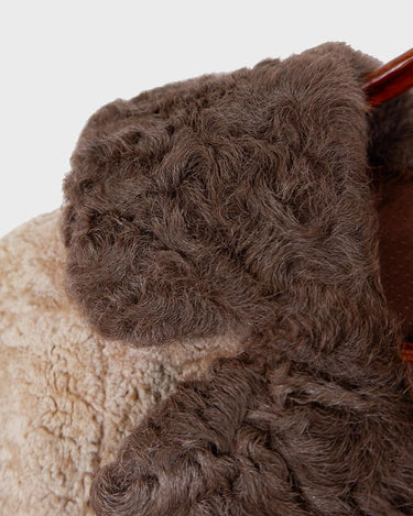 Wrap yourself in luxury with this premium vintage 70s brown real fur jacket! With its timeless design and XS size, you will stay cozy all winter long!