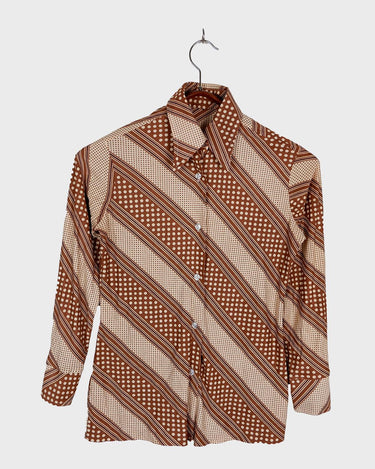 Get groovy with this vintage 70s brown dotted blouse in XS! Bring some playful vibes to your wardrobe with this unique throwback piece.