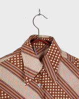 Get groovy with this vintage 70s brown dotted blouse in XS! Bring some playful vibes to your wardrobe with this unique throwback piece.
