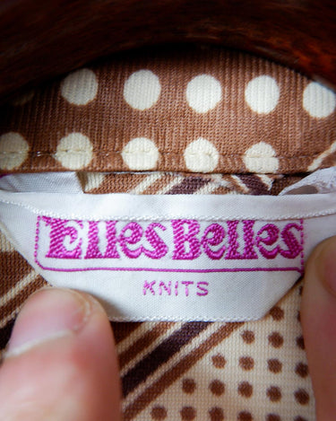 Get groovy with this vintage 70s brown dotted blouse in XS! Bring some playful vibes to your wardrobe with this unique throwback piece.