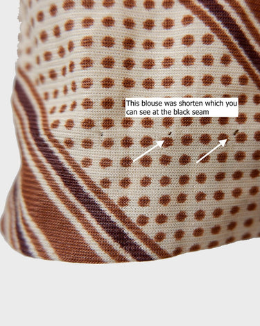 Get groovy with this vintage 70s brown dotted blouse in XS! Bring some playful vibes to your wardrobe with this unique throwback piece.