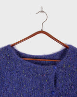 Add a touch of handmade luxury to your wardrobe with this purple mohair crop cardigan. Delicately crafted from mohair, this thin cardigan is perfect for those who love lightweight layers.