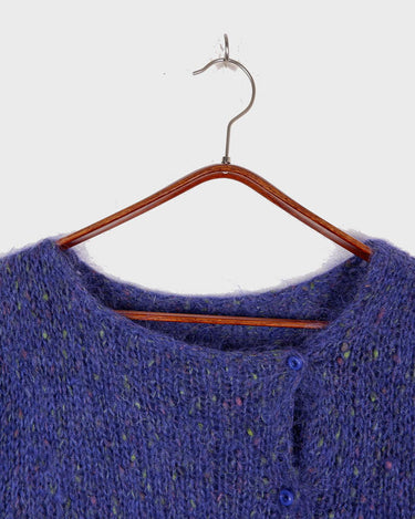 Add a touch of handmade luxury to your wardrobe with this purple mohair crop cardigan. Delicately crafted from mohair, this thin cardigan is perfect for those who love lightweight layers.