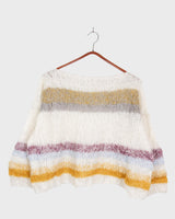 Experience the handmade goodness of our mohair spring/summer sweater! With its boxy cut and oversized fit, this sweater offers both style and comfort. Perfect for any season, this sweater is a must-have for any fashion-forward individual.