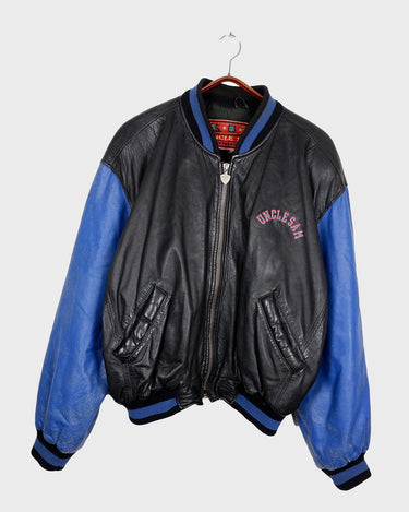 Unleash your inner rebel with this Vintage 80s Uncle Sam bomber leather jacket in size XL. Featuring a laid back, old-school vibe, this jacket exudes coolness and effortless style