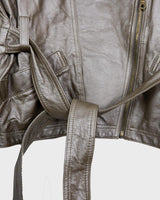 Unleash your wild side with the Premium Vintage 80s Dino'Z golden biker leather jacket! This unique piece features a thin material, making it perfect for spring. Who's ready to rock this golden leather jacket?